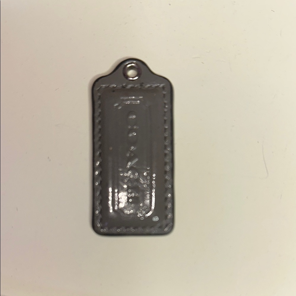 Coach Metallic Gray Leather Tag - Picture 3 of 3